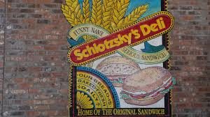 Schlotzskys deli sign